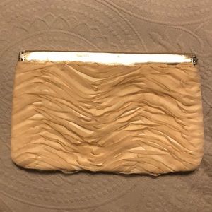 Nude ruffled clutch with rose gold trim
